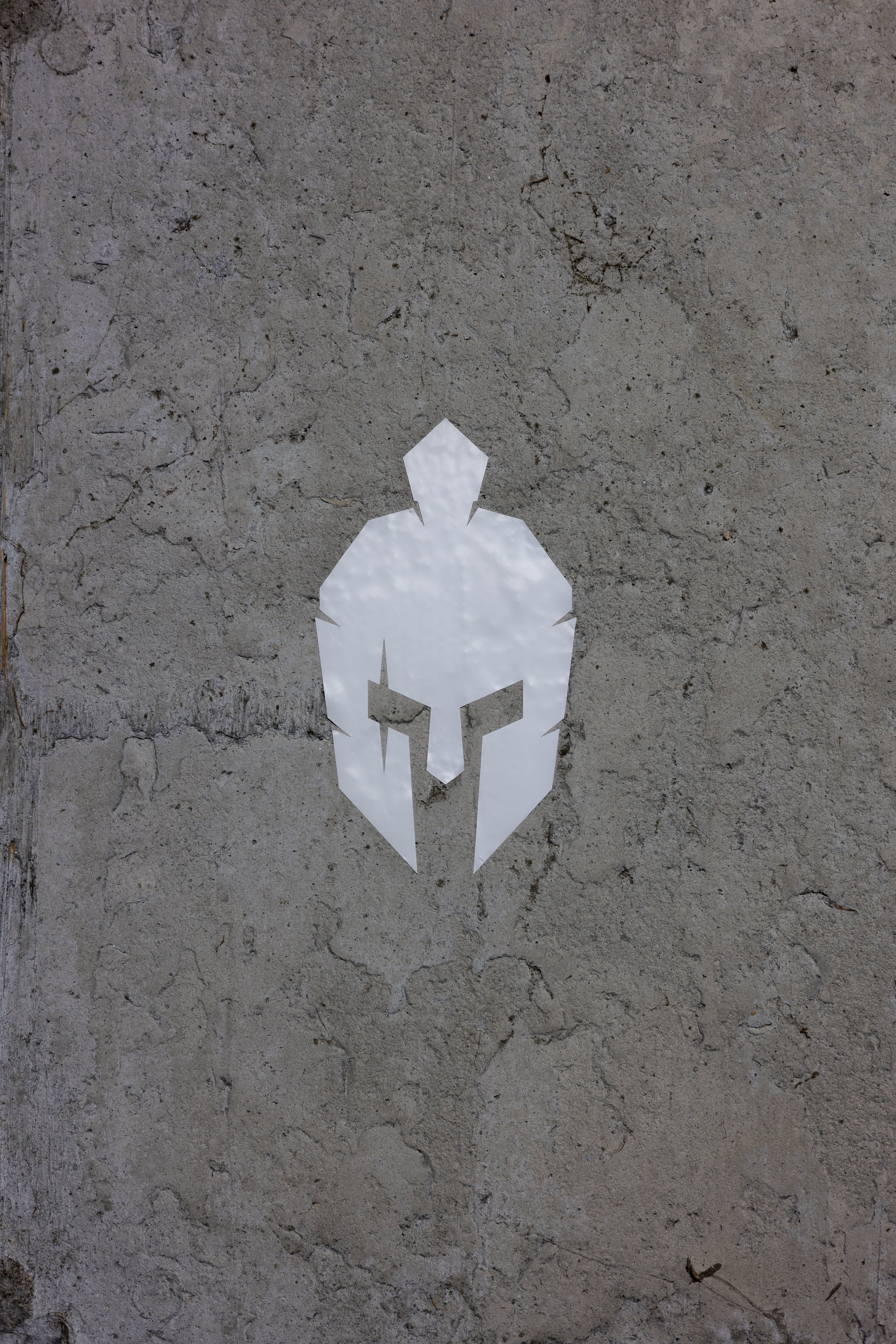 roman warrior helmet sticker on concrete wall